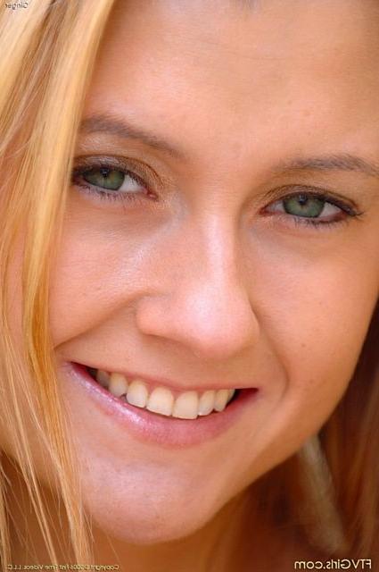 15P Cute petite blonde showing her goodies