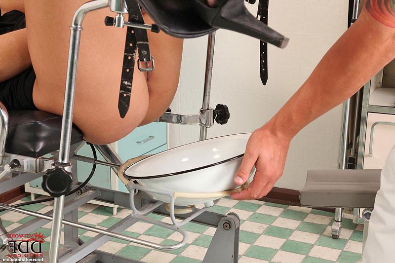 16P Jenni sexy brunette on high boots is examined by doctor