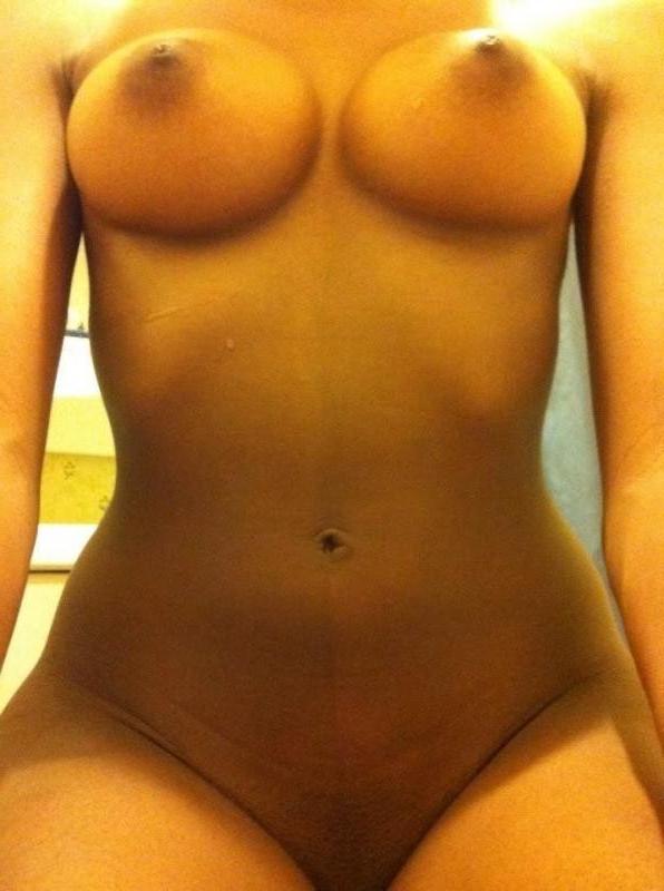 14P Horny black chick flaunts her fine breasts and bald pussy in hot