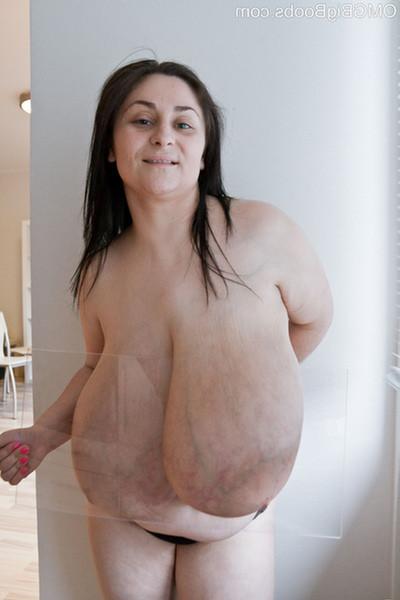 15P Amateur babe shows off off huge all natural 85JJ tits