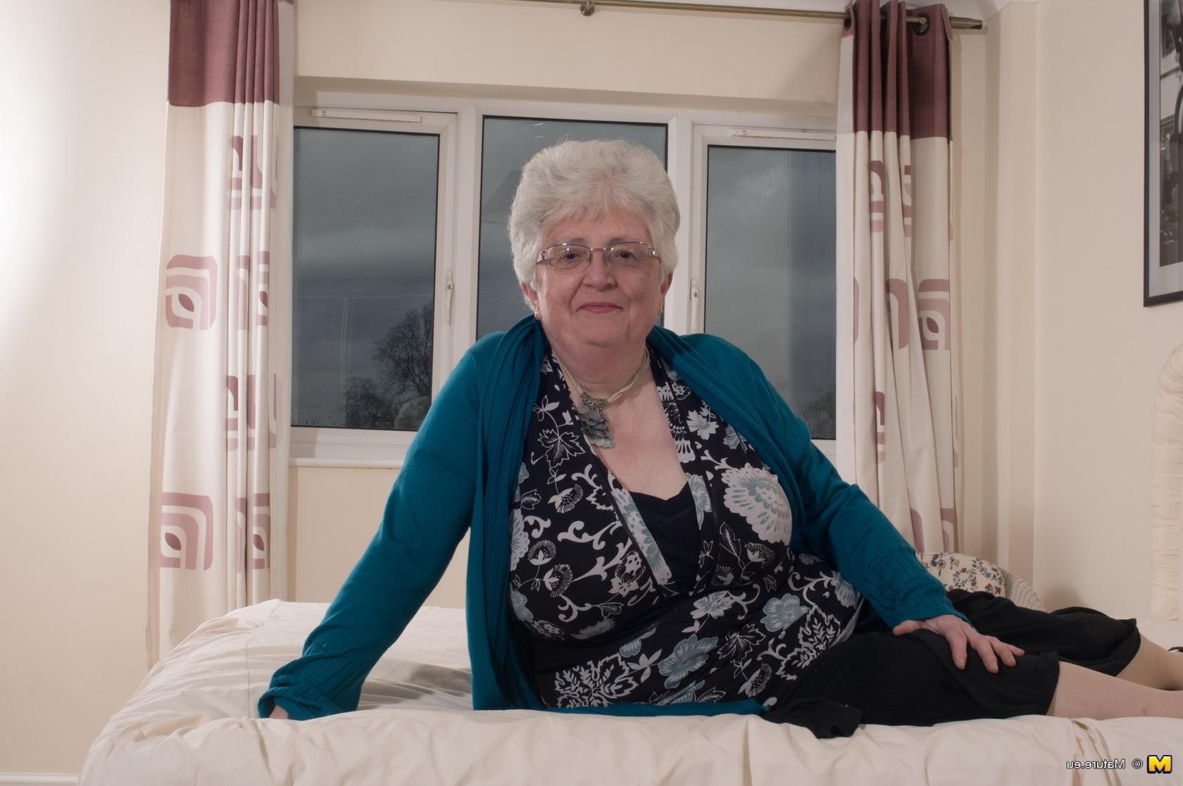 12P Naughty Big breasted British granny getting frisky