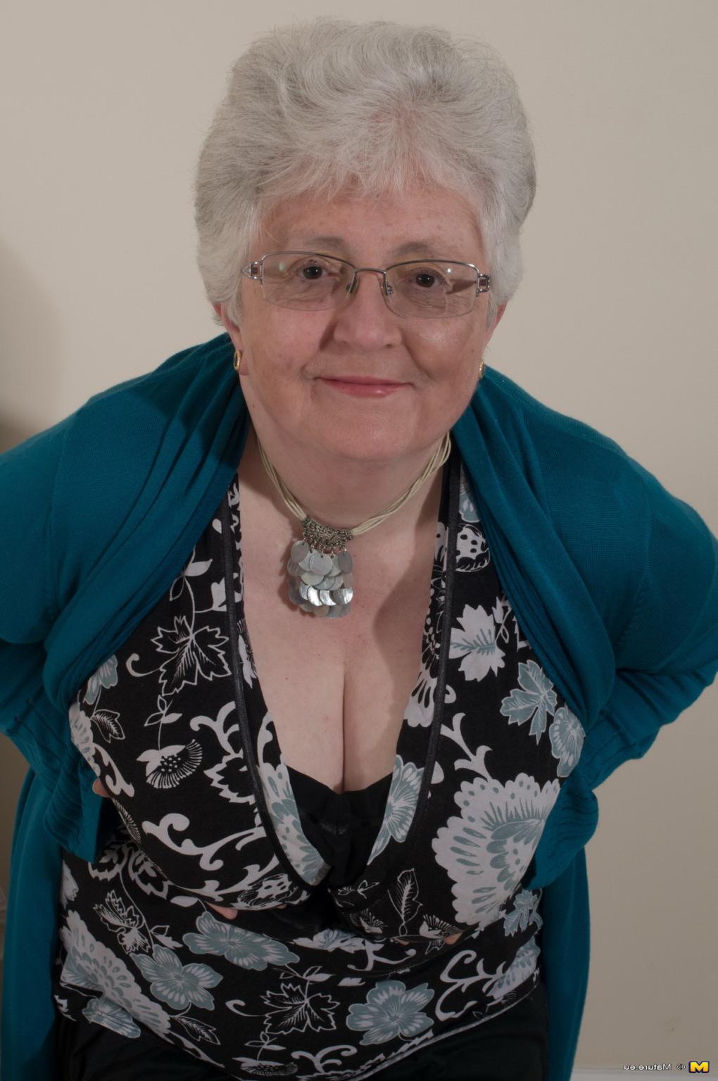 12P Naughty Big breasted British granny getting frisky