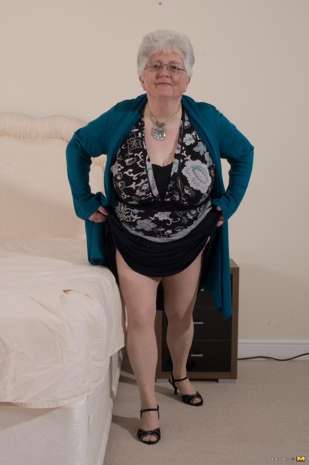 12P Naughty Big breasted British granny getting frisky