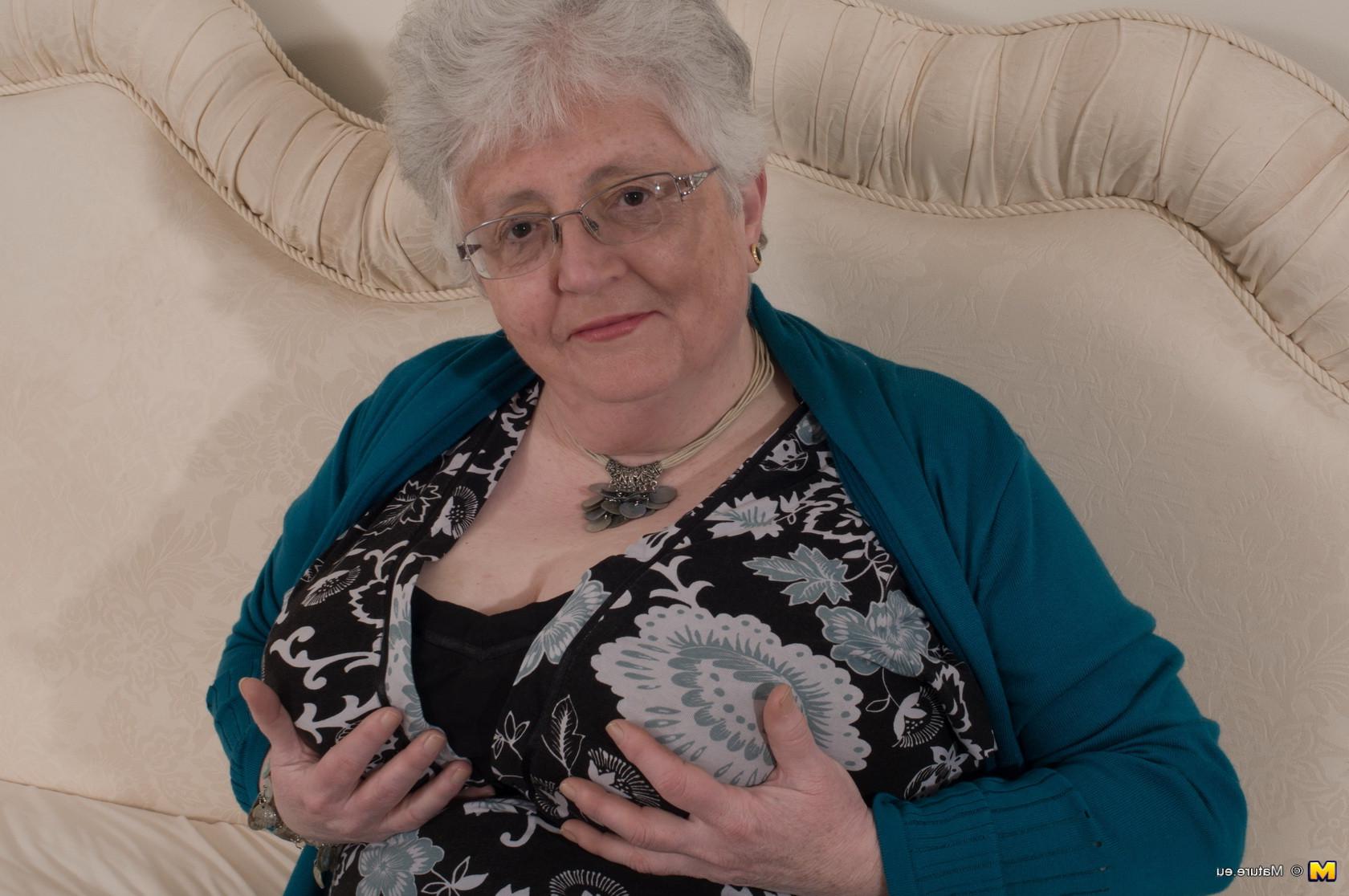 12P Naughty Big breasted British granny getting frisky