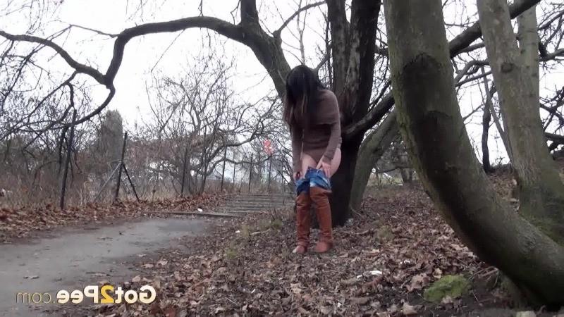15P Stunning dark haired girl is caught pissing