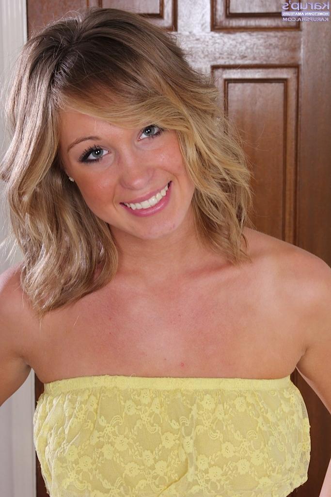 15P Perky breasted Ashley Jones rubs her shaved pussy