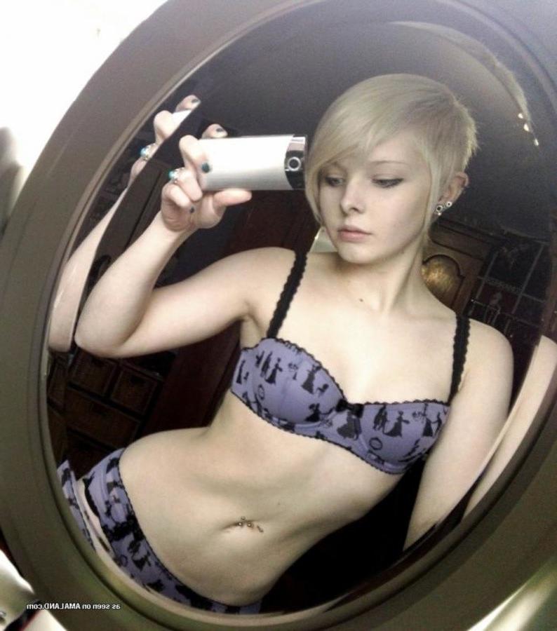 8P Two sexy emo babes posing around the home