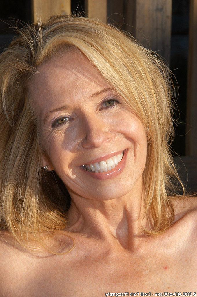 13P Smoking hot 54 year old in the garden for a tan