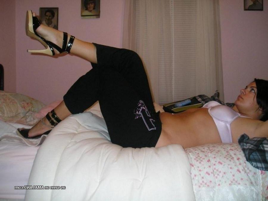 12P Sexy Spanish chick strips naked while selfshooting