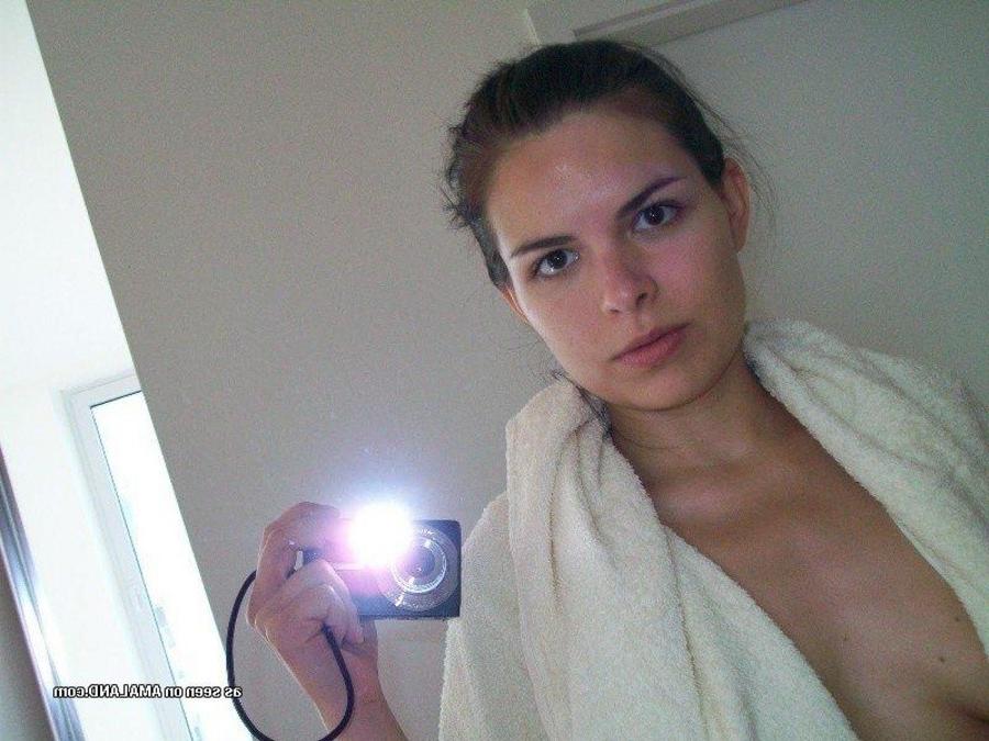 12P Sexy Spanish babe stripping naked for the cam