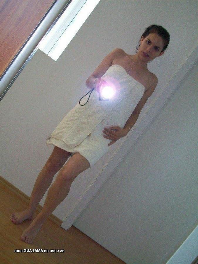 12P Sexy Spanish babe stripping naked for the cam