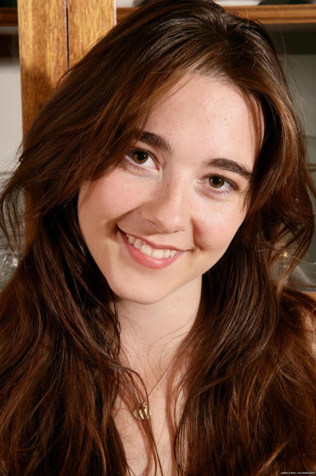 15P Teen honey Krissy strips to show off her young hairy snatch