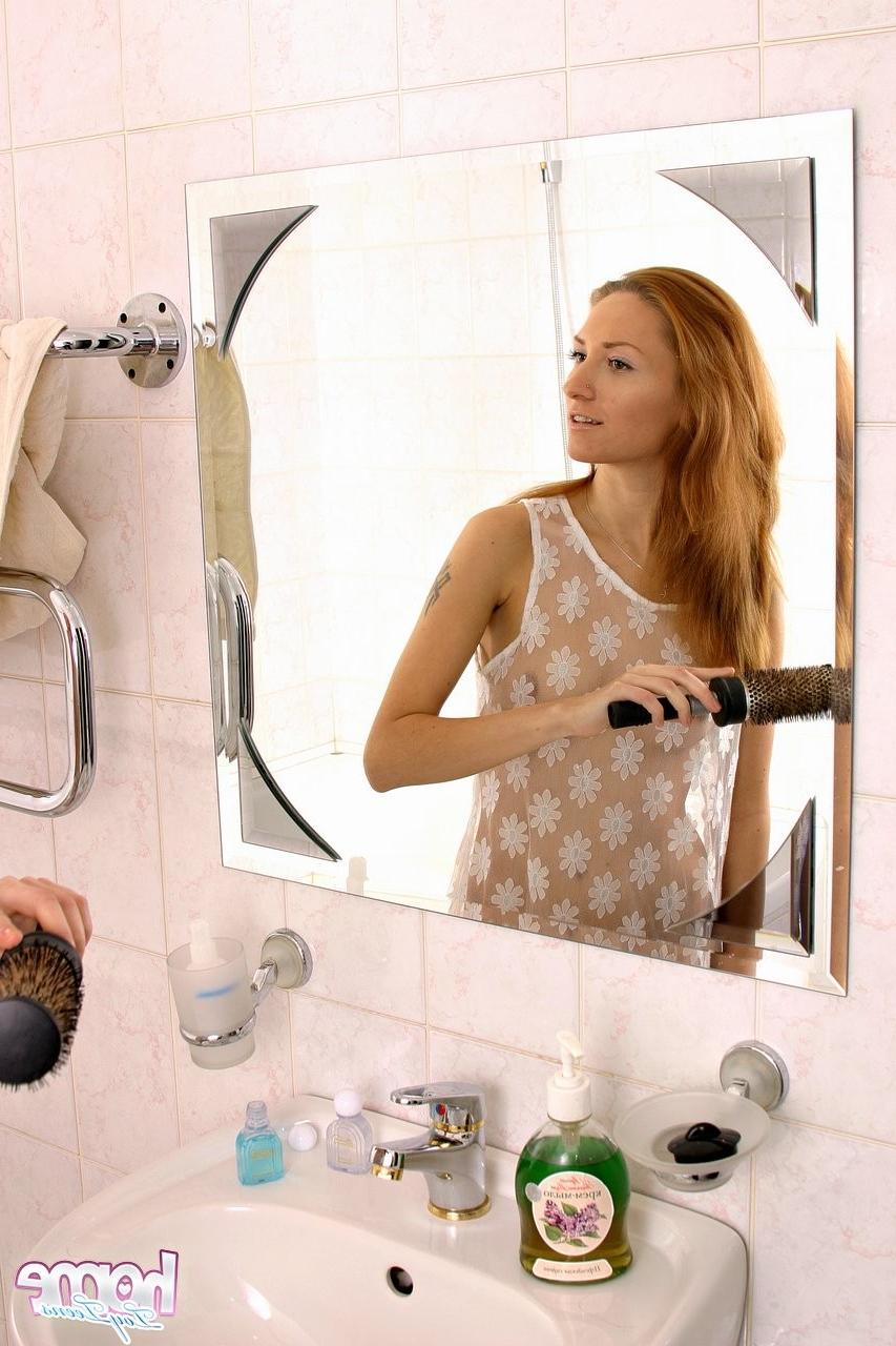 15P Redhead teen fucks huge toy in shower