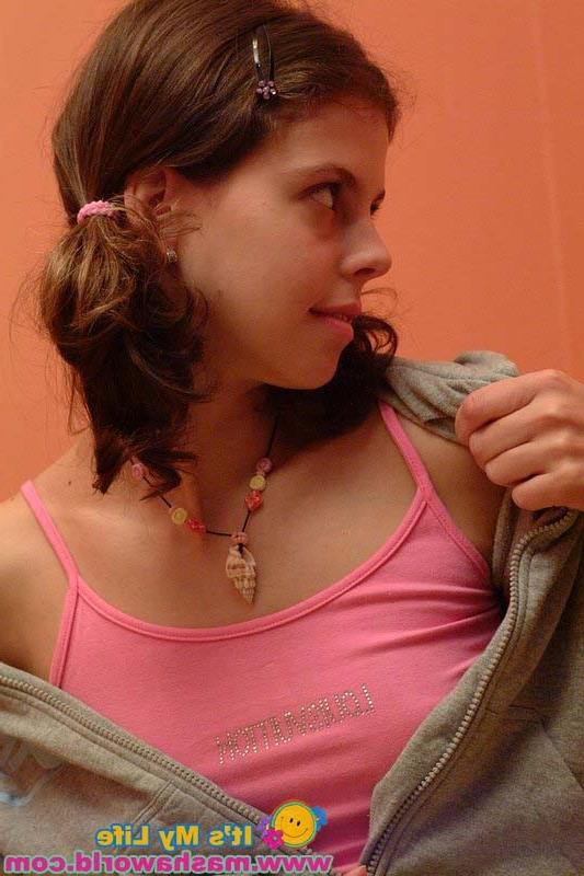 15P Teenie opens wide her petite pussy lips