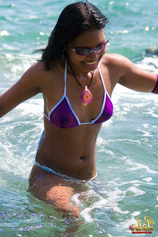 15P Beautiful Indian babe flashes her dark buns in tiny bikini