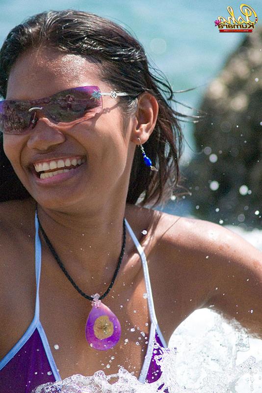 15P Beautiful Indian babe flashes her dark buns in tiny bikini