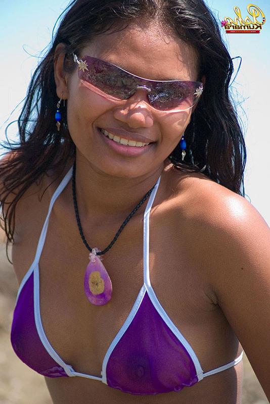 15P Beautiful Indian babe flashes her dark buns in tiny bikini