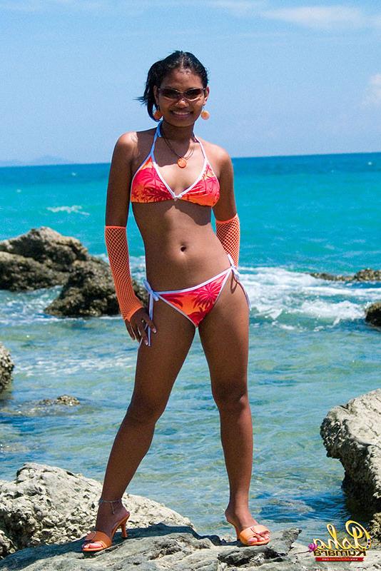 15P Cute Indian girl shows ass crack and brown tits in bikini