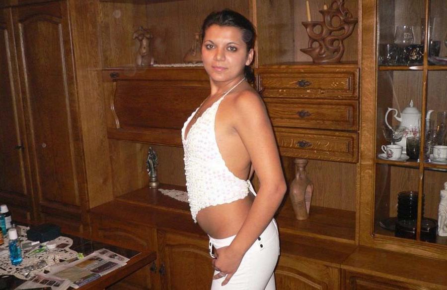 12P Photo set of a Spanish senorita posing sexy