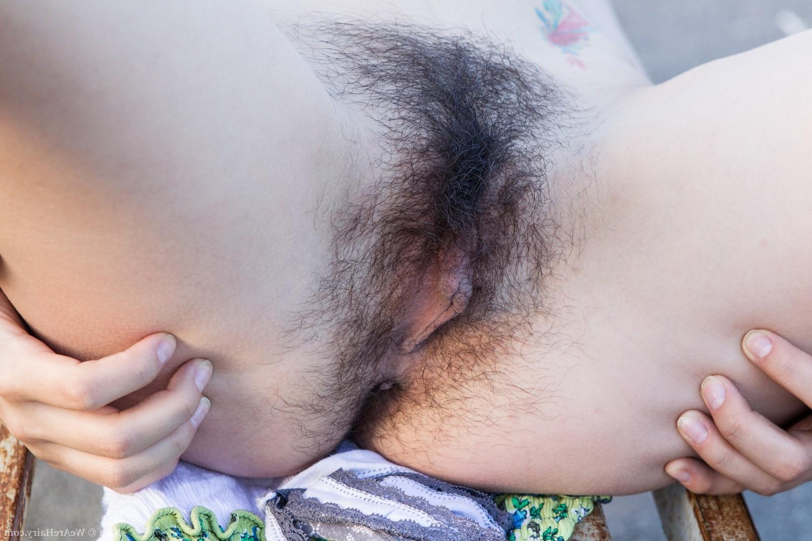 16P Hairy girl Nina poses in the tall grass