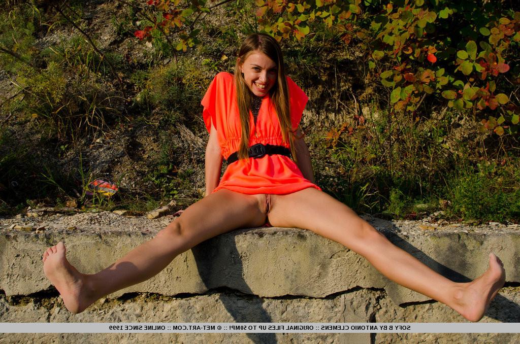 18P A smiling and confident Sofy frolics among the grass
