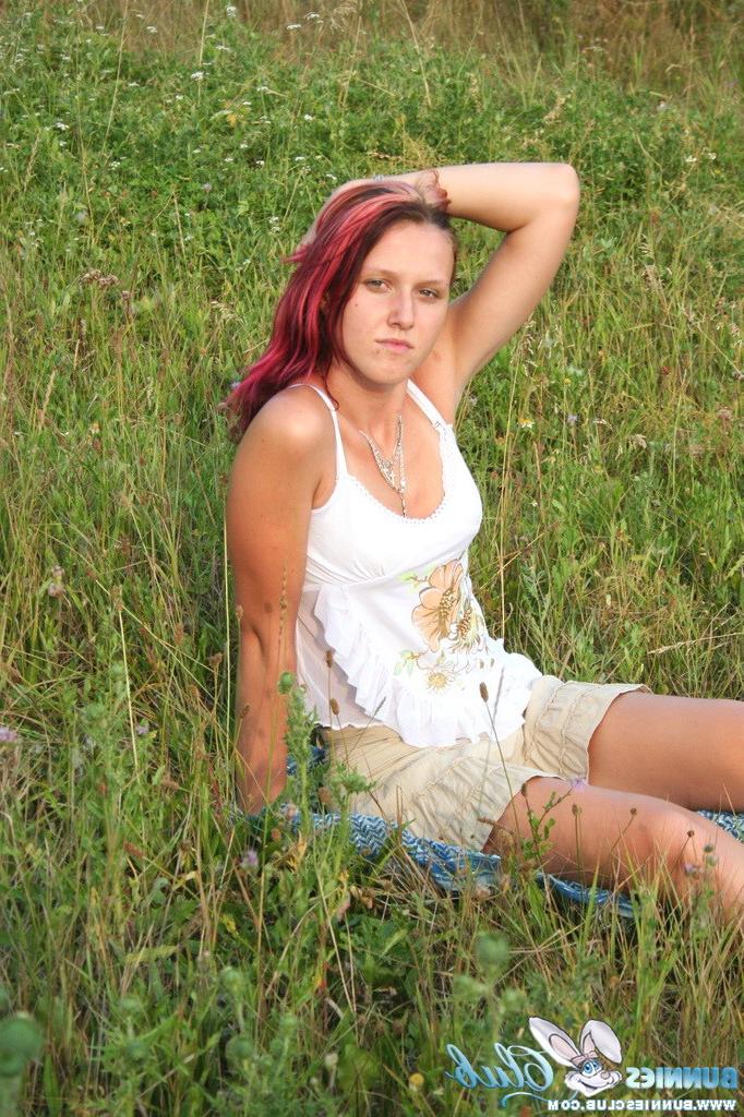 20P Cute redhead girl in the grass