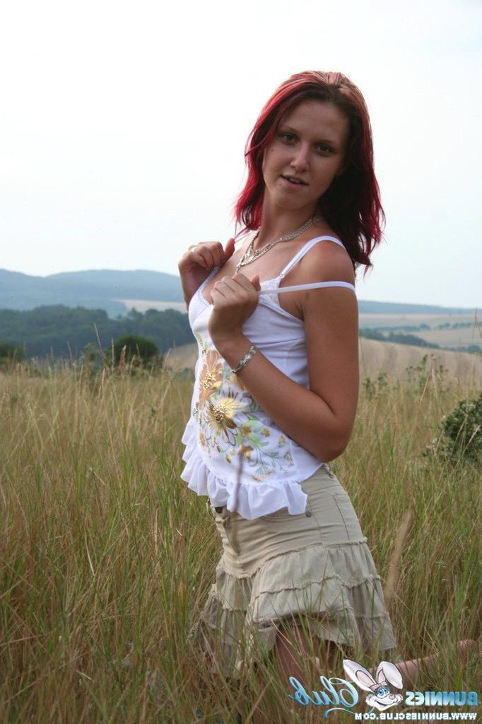 20P Cute redhead girl in the grass