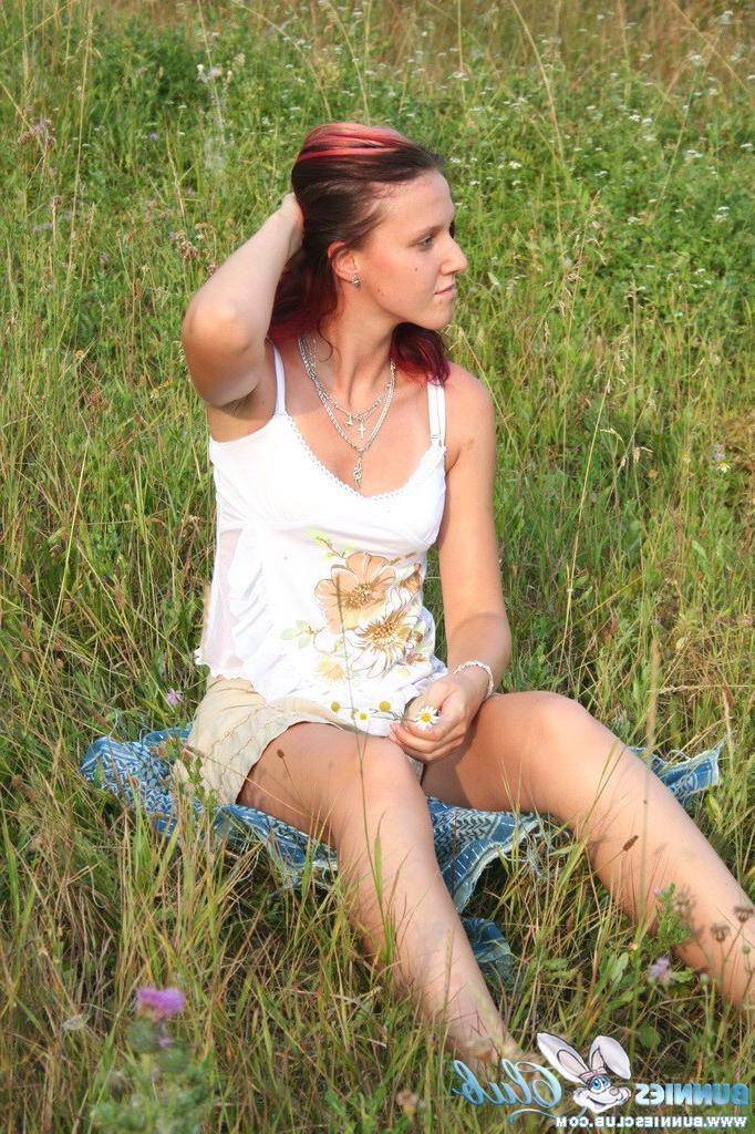 20P Cute redhead girl in the grass