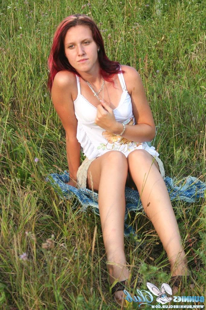 20P Cute redhead girl in the grass
