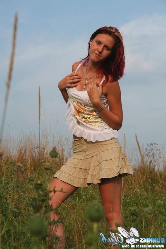20P Cute redhead girl in the grass