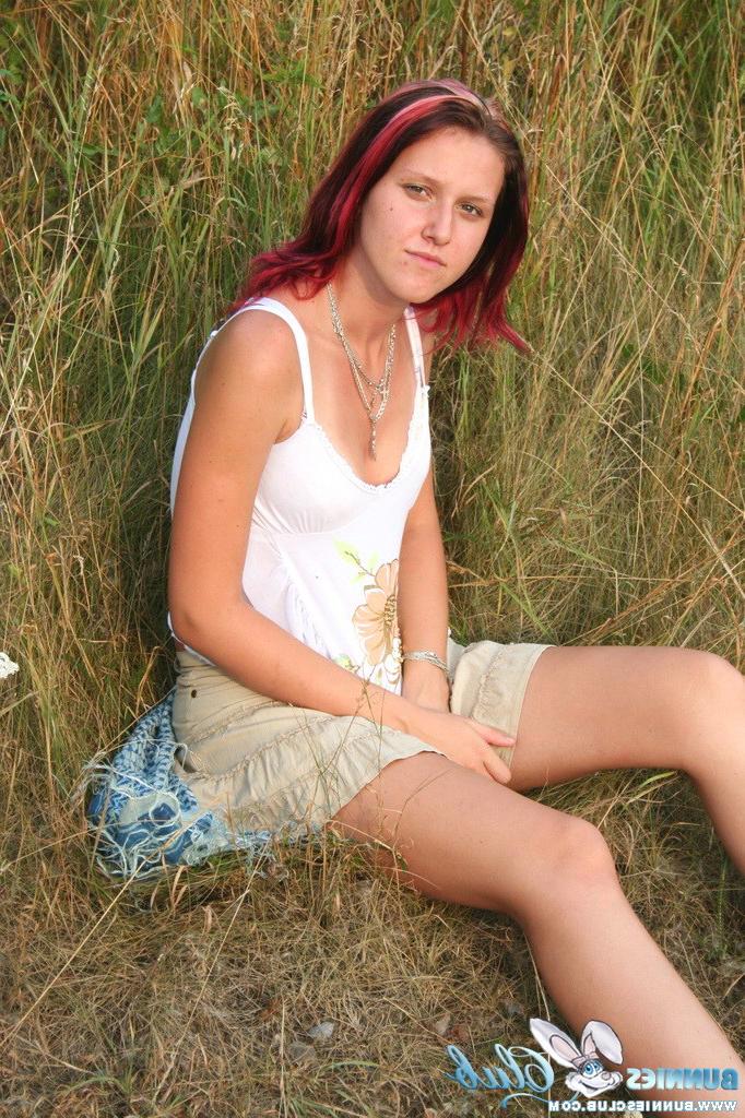 20P Cute redhead girl in the grass