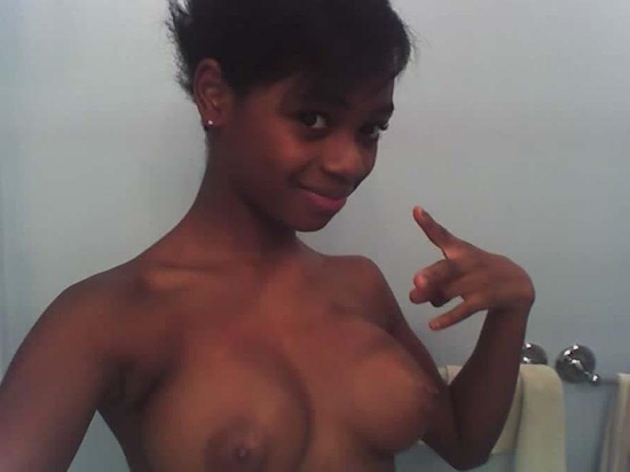 12P Ebony girlfriend poses and gets naked outdoors on a sports bike