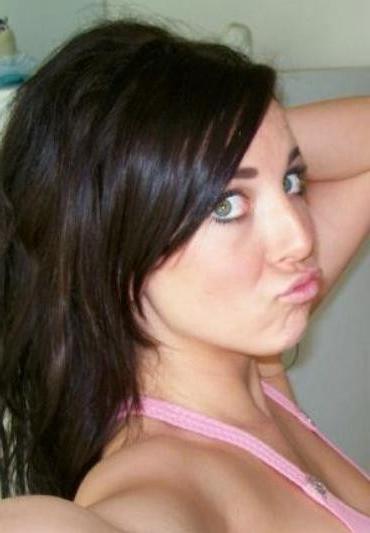 15P Smoking brunette chick Raven shows her pussy