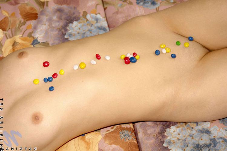 15P Sweet teen katrina showering her petite body with candies