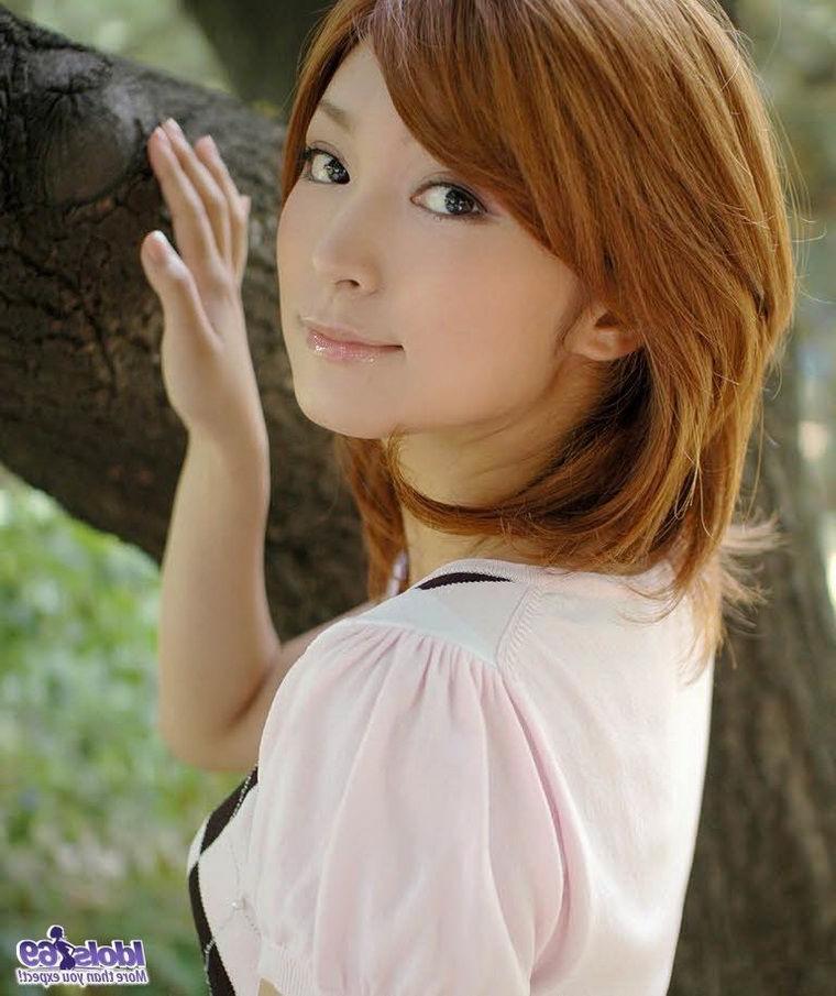 15P Redhead asian Karin showing small tits and panties