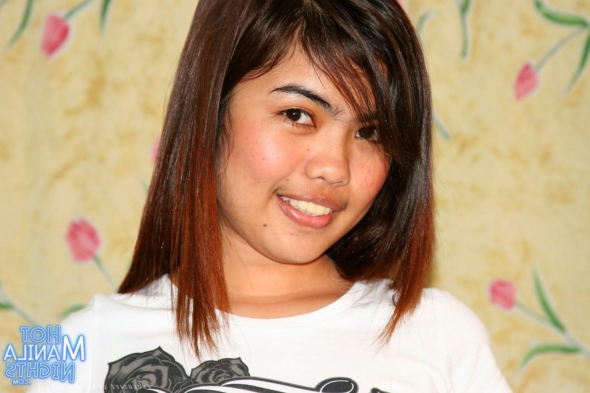 15P Young filipina spreads her bald pussy close on camera