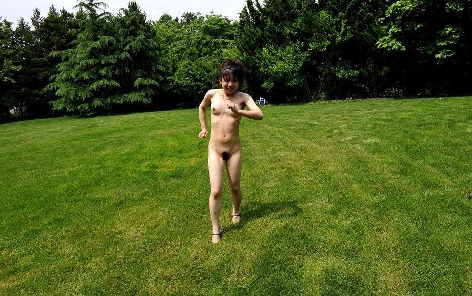 15P Petite asian teen Youzn poses nude outdoors