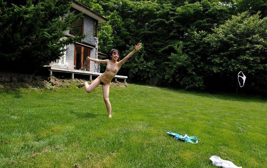 15P Petite asian teen Youzn poses nude outdoors