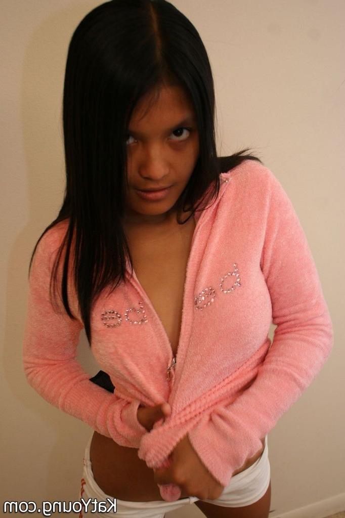 16P Kat Young :: Beatiful teenie Kat in pink blouse stripping and flashing pussy