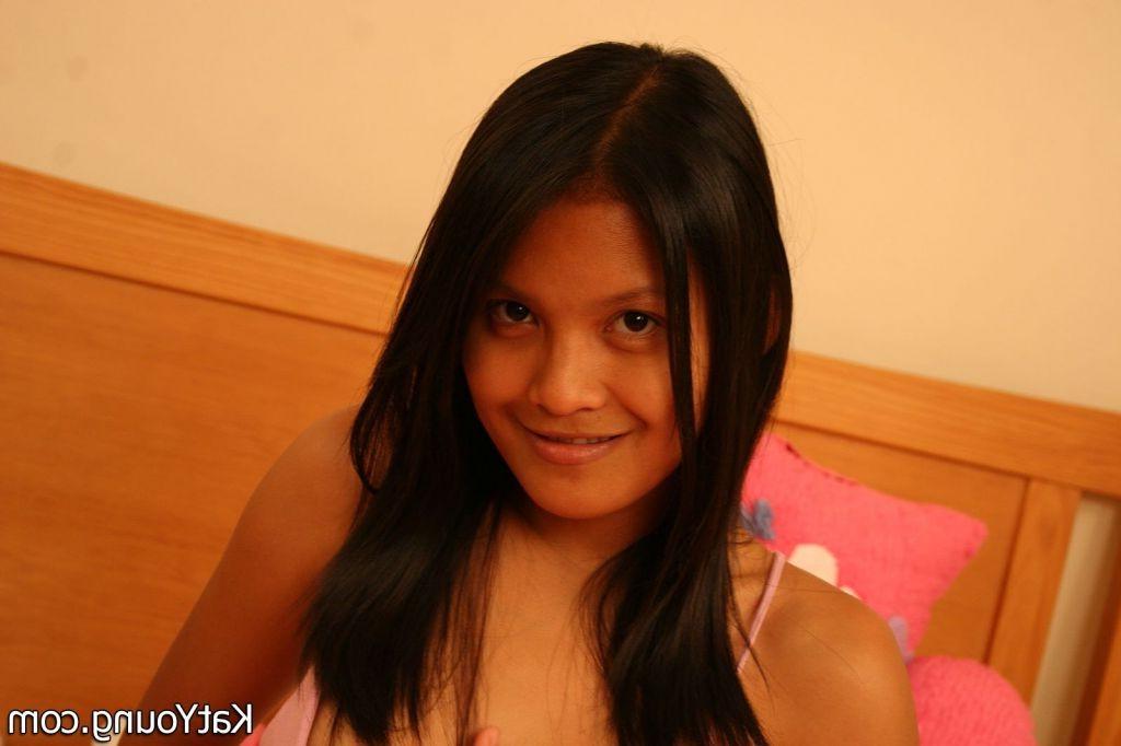16P Kat Young Picture Gallery:: Petite asian babe Kat with sexy body stripping in th