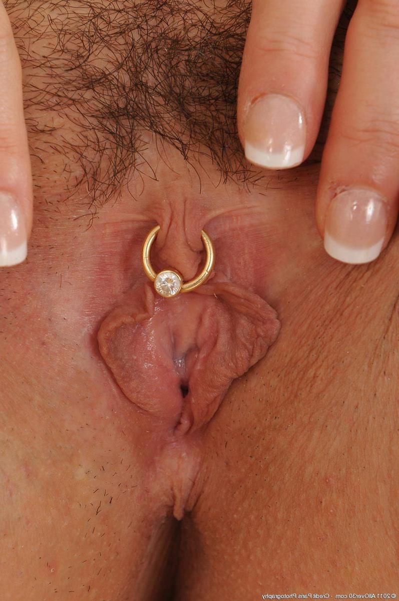15P Hot milf pornstar shows off her pink pierced snatch