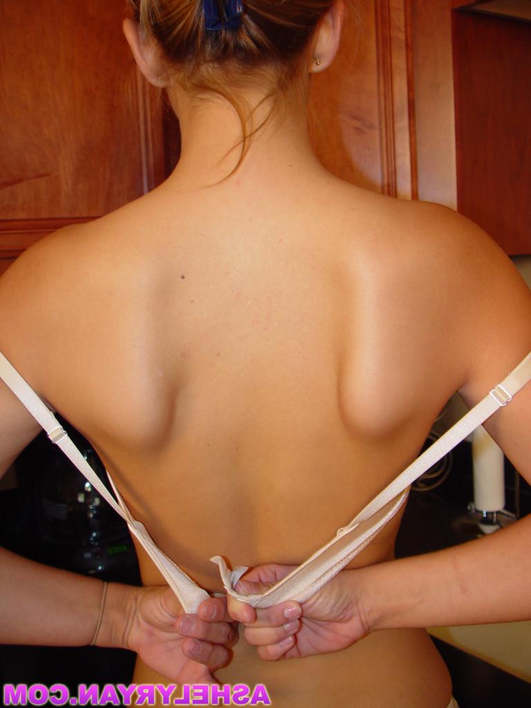 15P Ashley shows off how perky her tits are