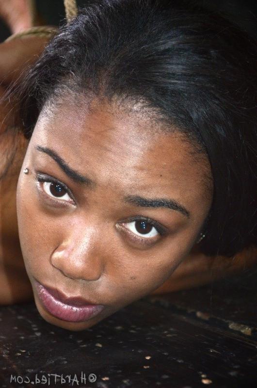 16P Chanell Heart ebony is bound in rope with pussy exposed