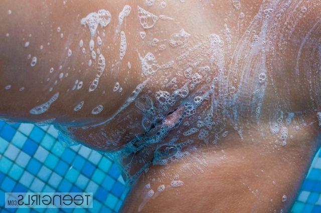 15P little brunette teen fucking herself with a big blue dildo in a shower