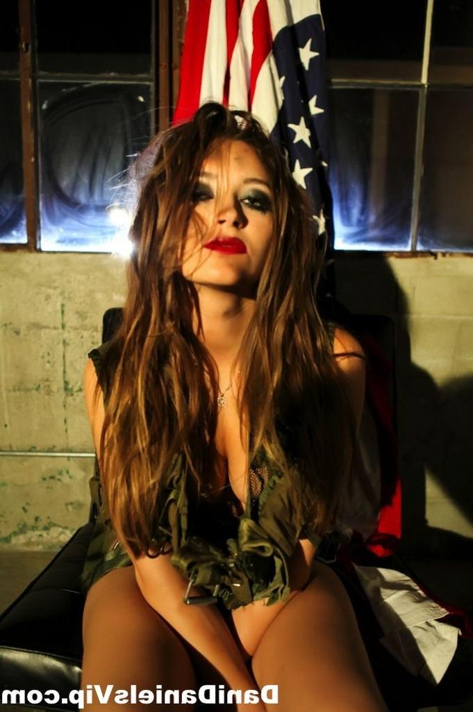 15P Dani Daniels posing with an american flag