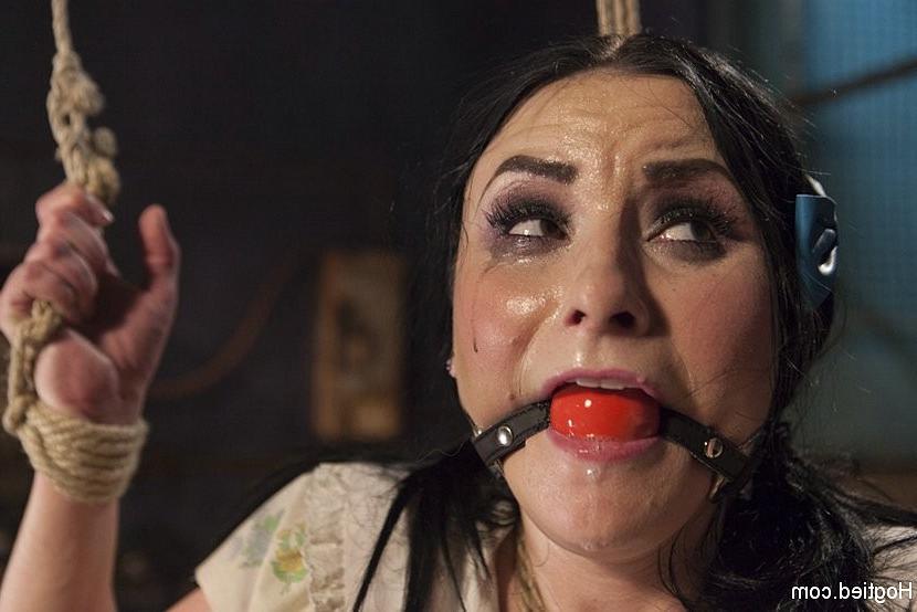 9P Veruca James is bound in rope with tits exposed and pussy dildo stick fucked