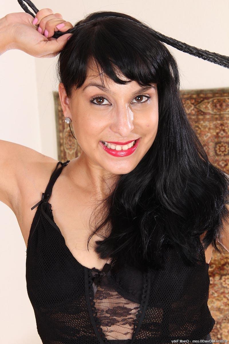 15P Horny milf Betty Green shows off her hairy pussy