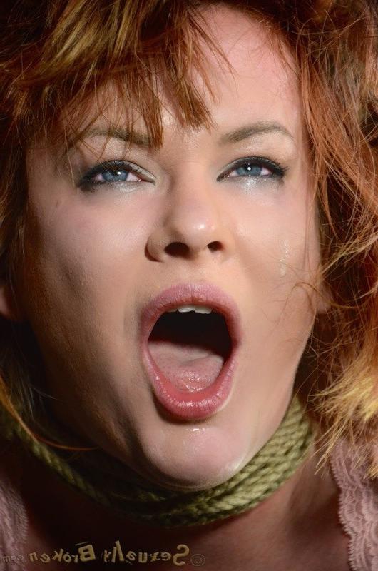 16P Claire Robbins sexy redhead is bound in rope and made to suck cock
