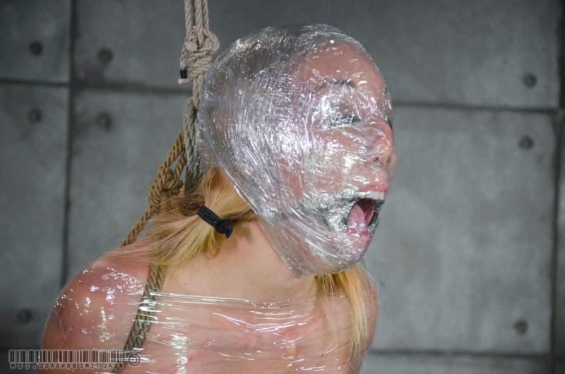 16P Emma Haize is wrapped in seethru plastic and toyed