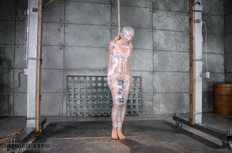 16P Emma Haize is wrapped in seethru plastic and toyed